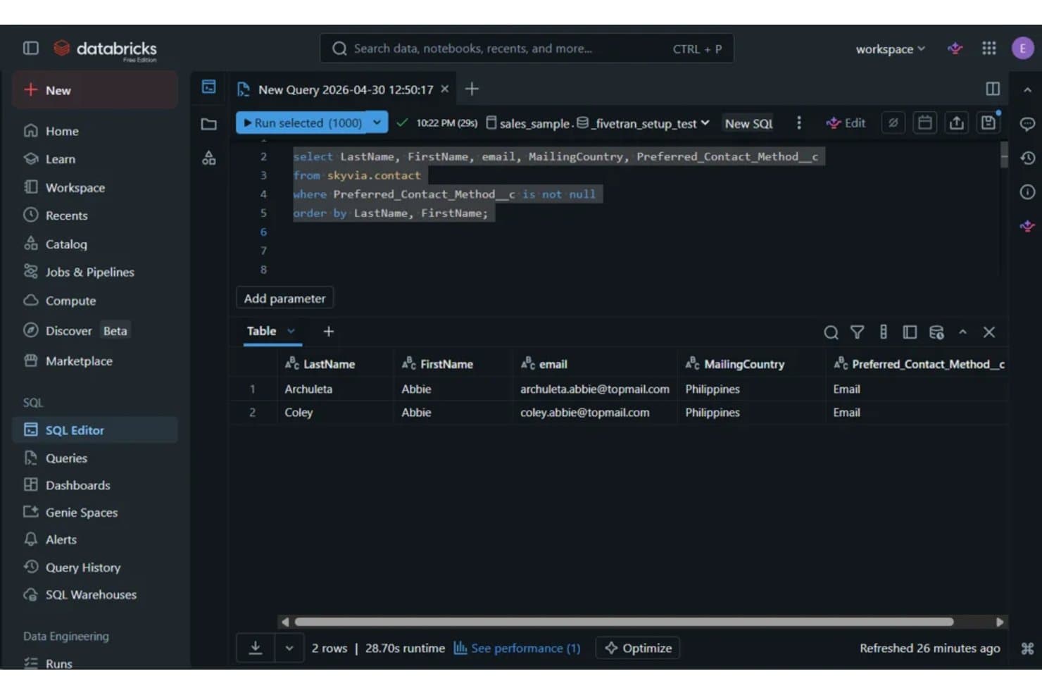 Skyvia SQL query in Databricks returning Salesforce contact records with email and country fields.