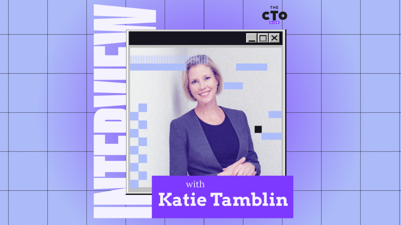 CTO interview with Kate Tamblin: A professional woman in a business suit sitting across from an interviewer, engaged in a conversation. IT Optimization featured image