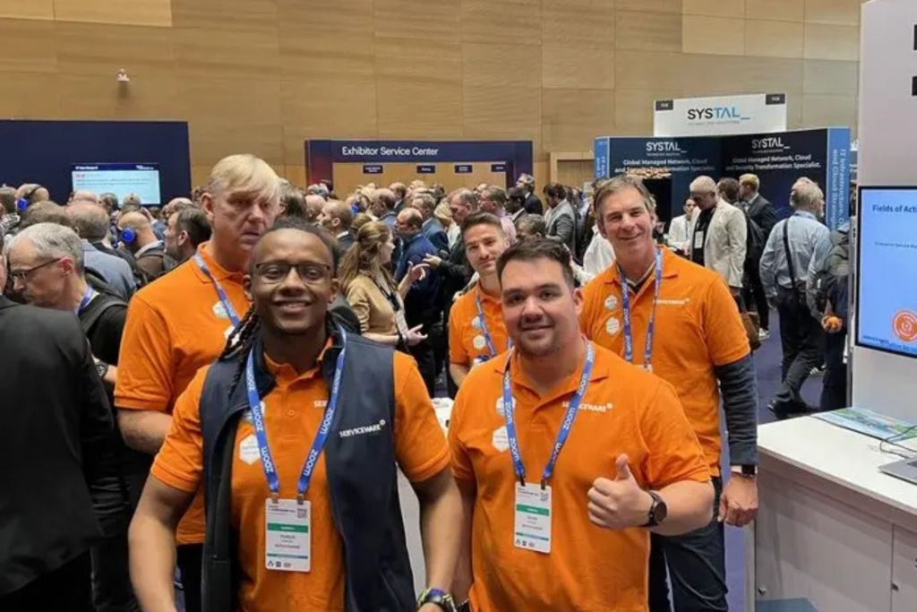 Attendees and vendors gathered in a busy exhibition area at Gartner IT Symposium/Xpo