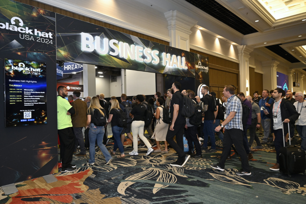 Black Hat USA 2024 attendees entering the Business Hall exhibition area