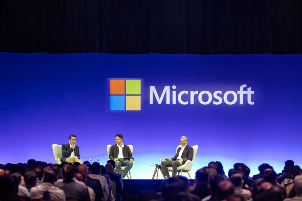Neetan Chopra, chief digital &amp; information officer of IndiGo; Tanuj Vohra, chief technology officer of HighRadius, and Ahmed Mazhari, president, Microsoft Asia, discussing applications of Azure AI Studio at the Microsoft AI Tour in Mumbai, India