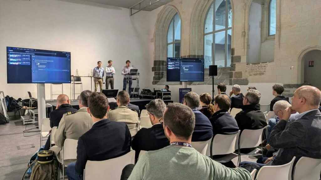 Audience attending a cybersecurity presentation at European Cyber Week