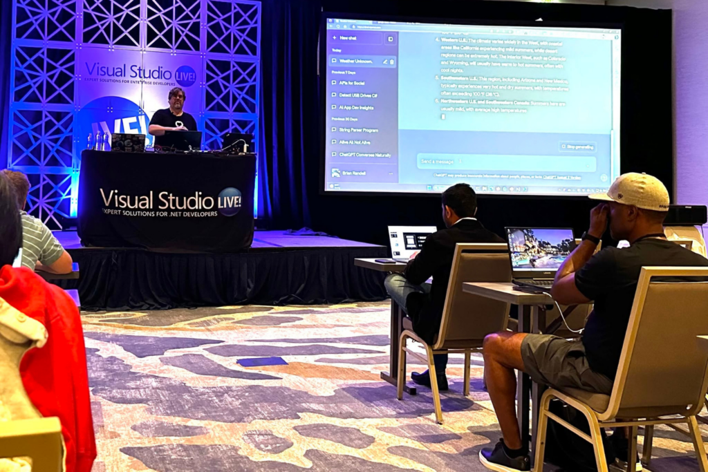 Visual Studio Live! speaker presenting to developers during a technical session