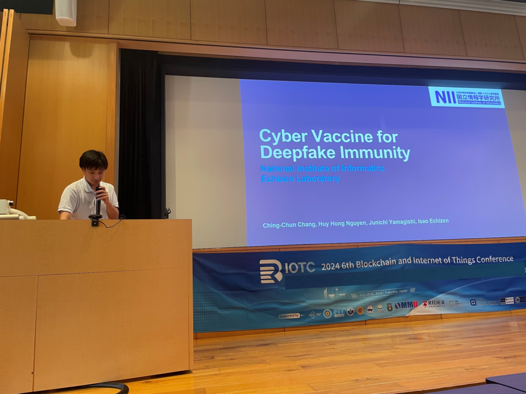 A speaker presenting his research findings at the Blockchain and Internet of Things Conference