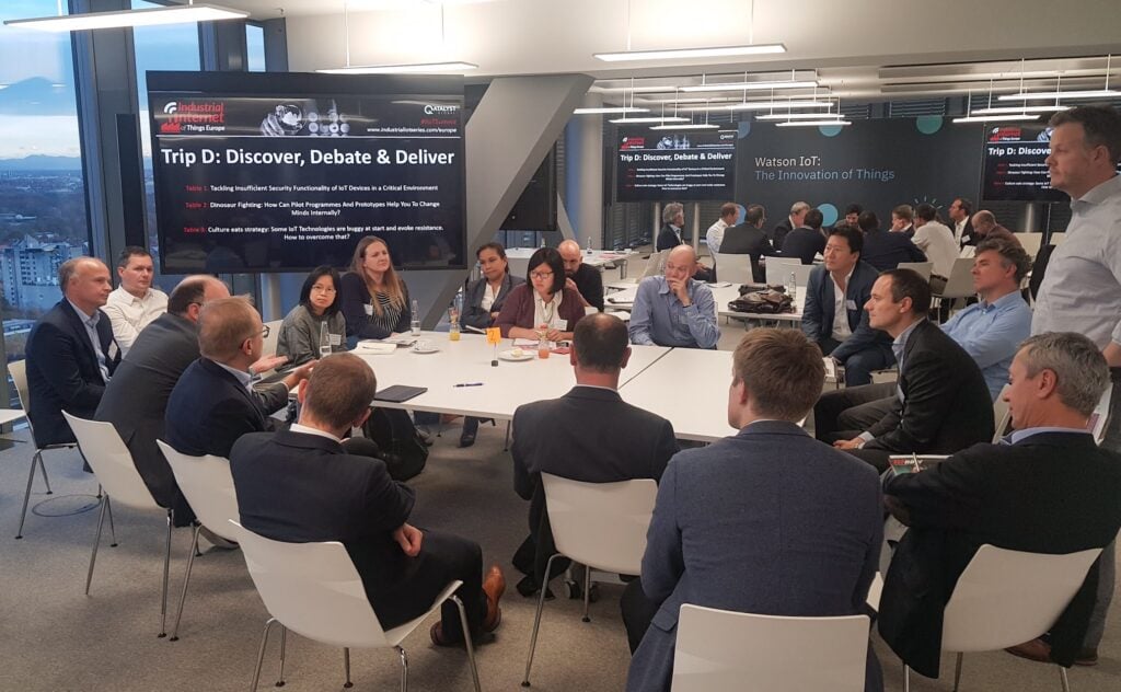 Professionals participating in an interactive roundtable session at CS4CA Canada.