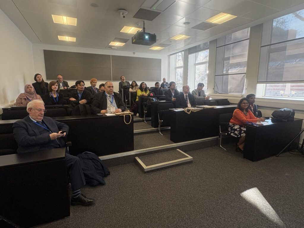 A packed room of experts and researchers at the IEMTRONICS