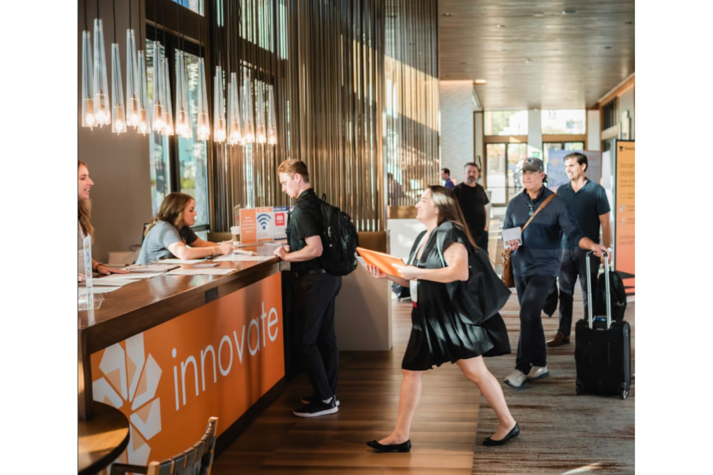 Innovate Cybersecurity Summit Scottsdale attendees checking in at registration