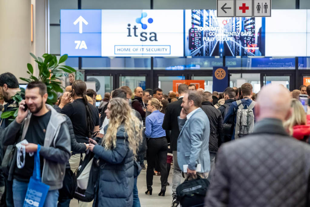 it-sa Expo&Congress attendees gathering at the entrance of the cybersecurity event