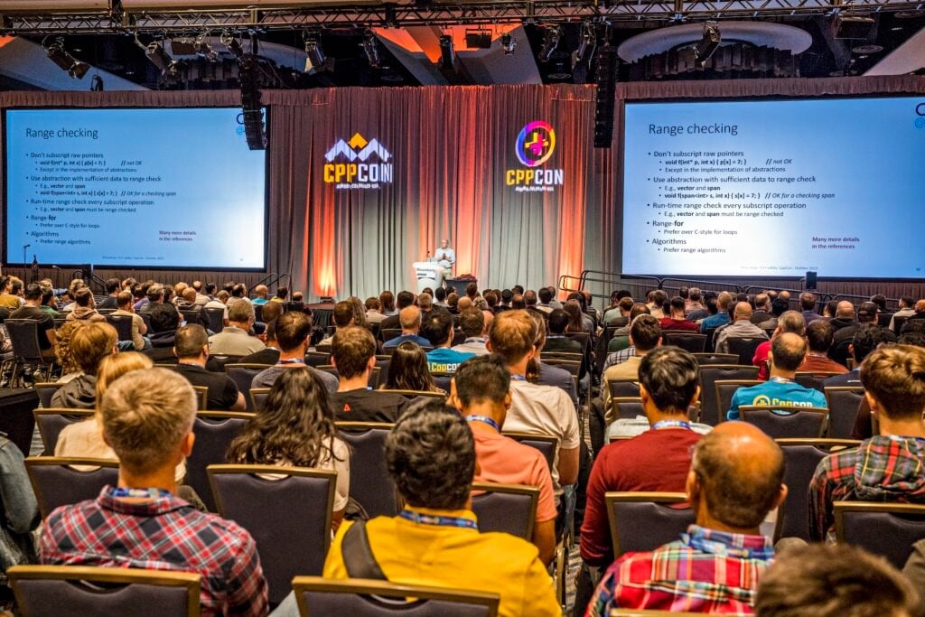 Audience attending a keynote session at CppCon