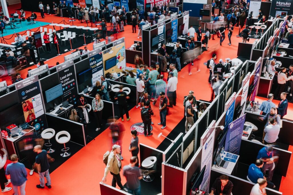 A crowded exhibition hall filled with attendees at the Big Data LDN conference