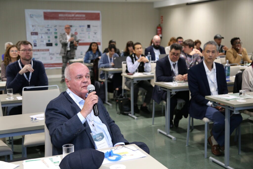 An attendee of the Data Science &amp; AI Summit participating in a Q&amp;A session