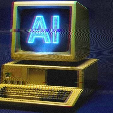 old school desktop computer with AI written on the screen