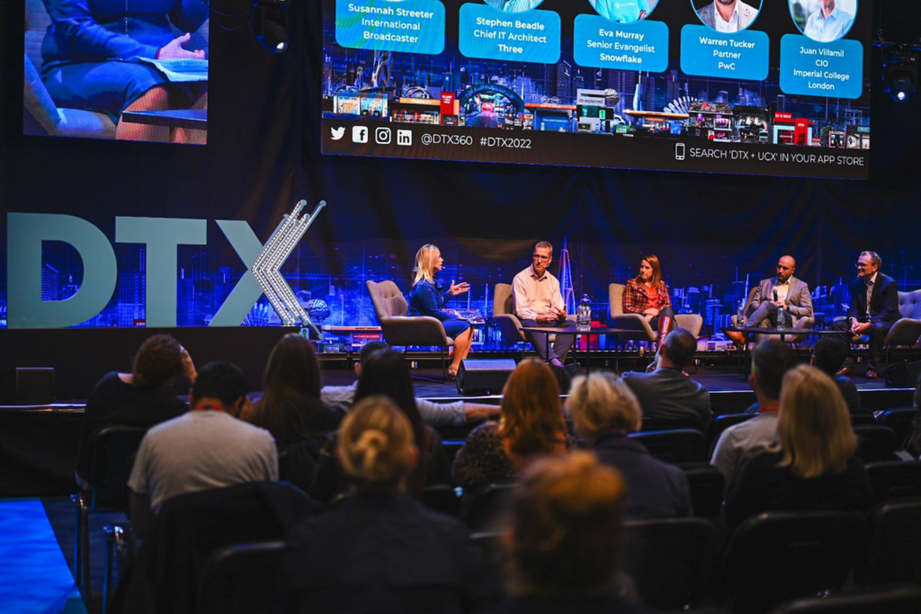 Panel discussion taking place on stage at DTX London